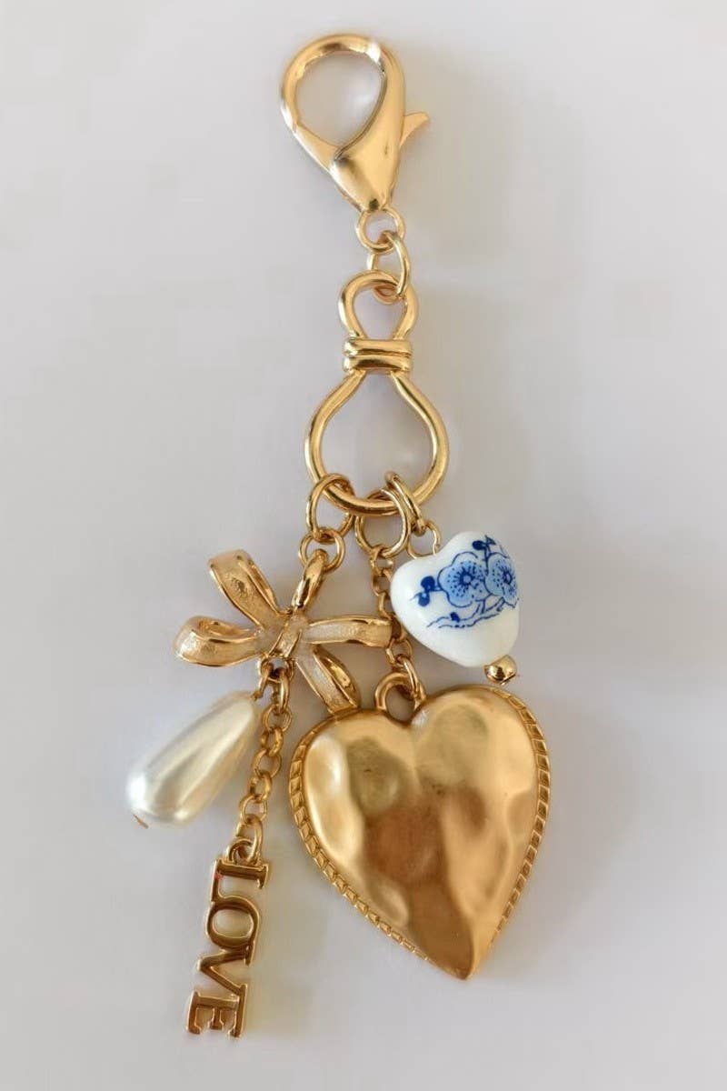 PORCELAIN BOW HEART LOVE BAG CHARM | Gold