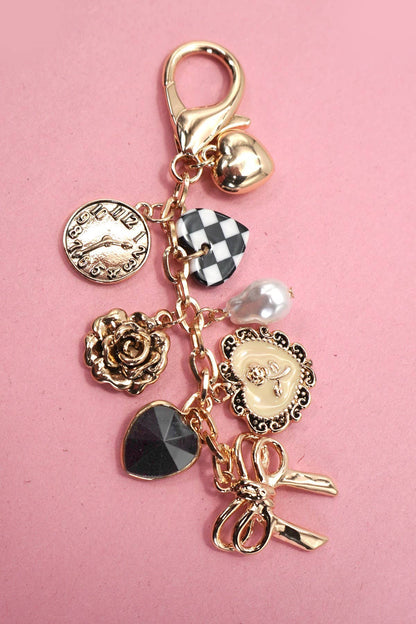 BOW CHECKER HEART FLOWER BAG CHARM | Gold